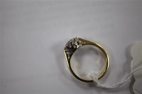 An 18ct gold and solitaire diamond ring, size L.